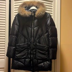 Puffer coat with fox fur hood trim